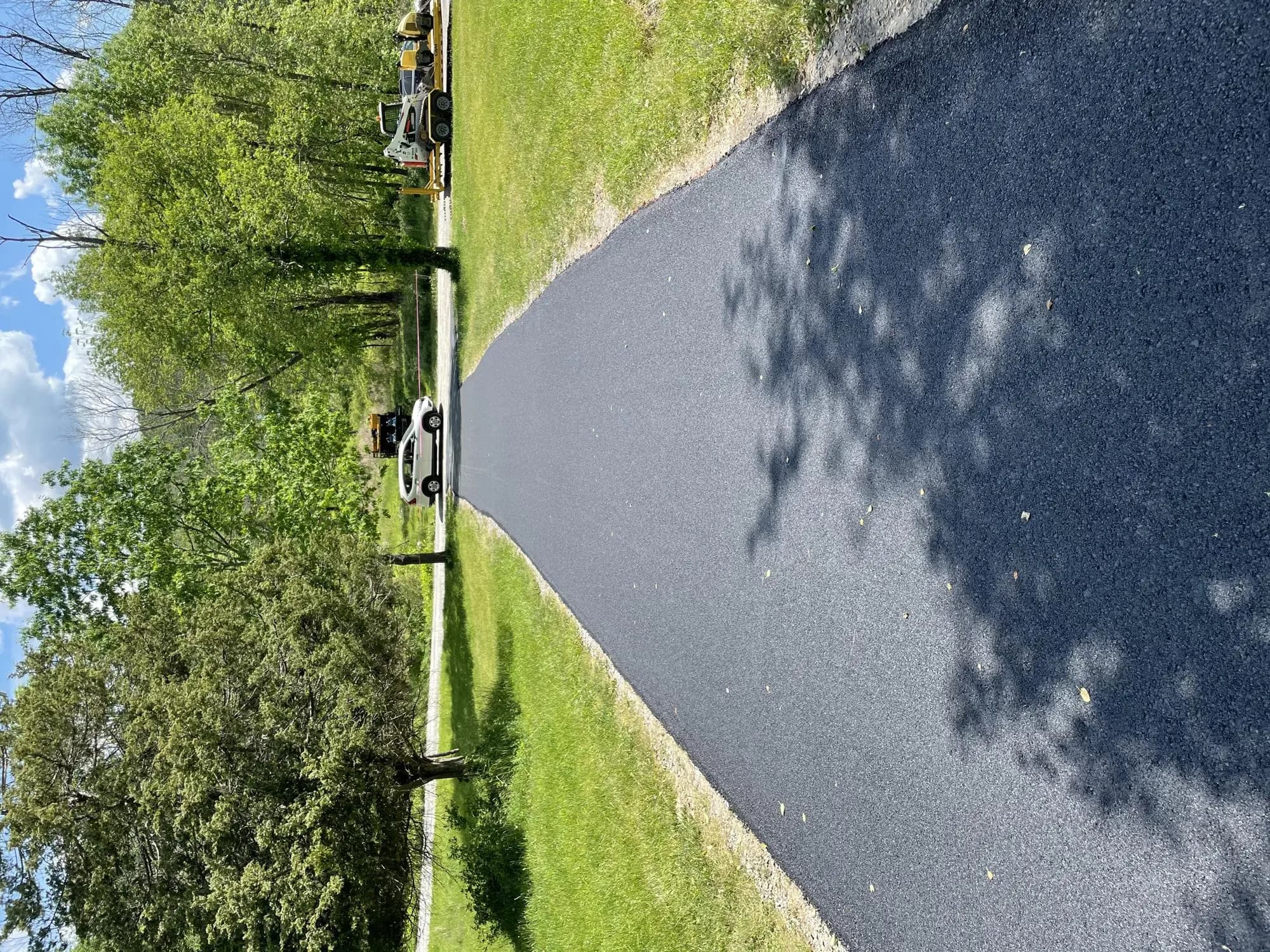 New asphalt road installation by Muddy Driveways and Paving