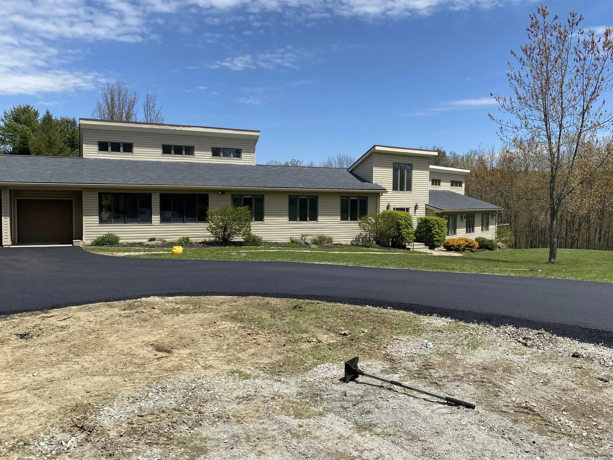 New asphalt road installation by Muddy Driveways and Paving