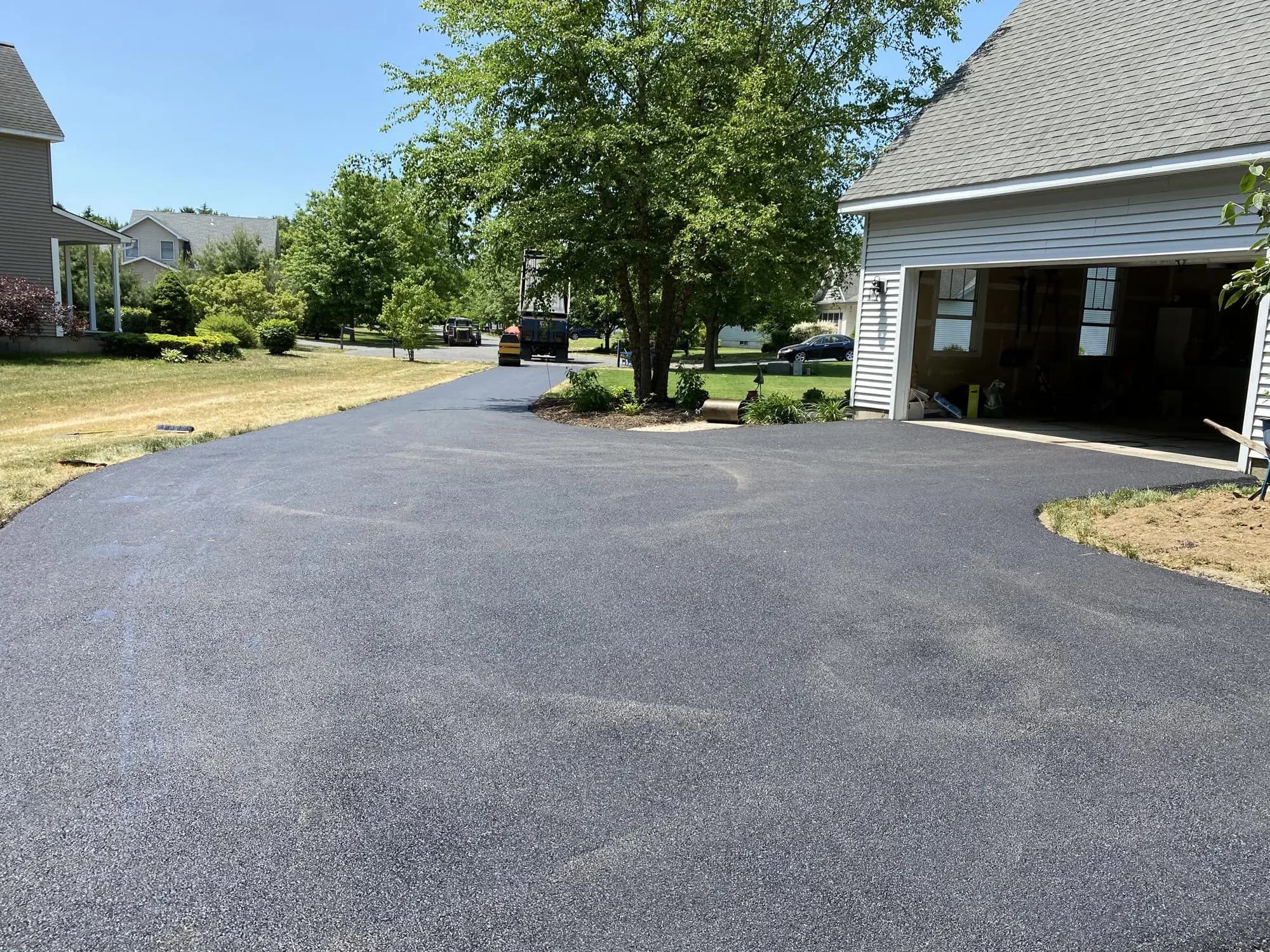 Smooth asphalt driveway by Muddy Driveways and Paving, Hudson Valley