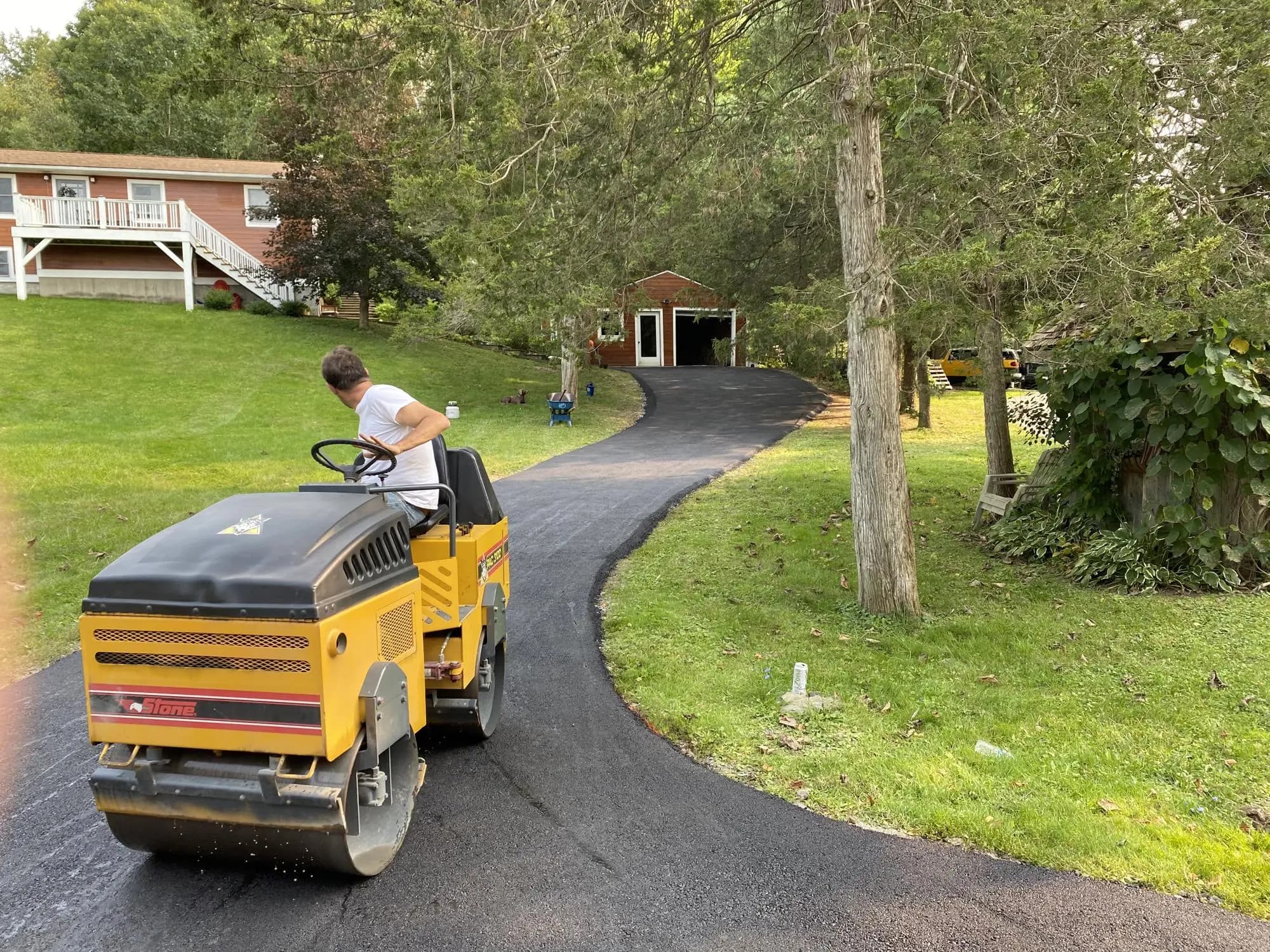 Smooth asphalt driveway by Muddy Driveways and Paving, Hudson Valley