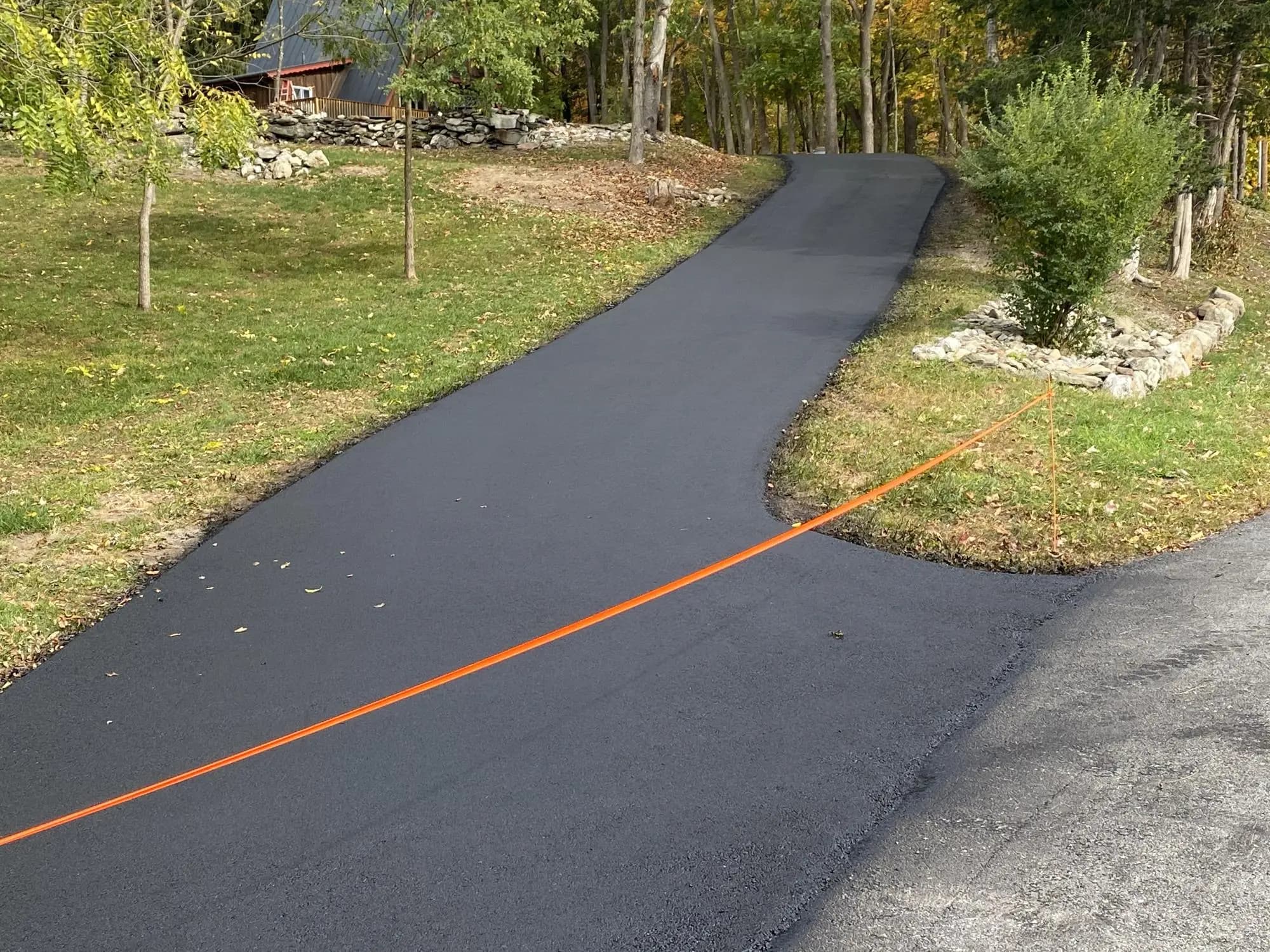 Muddy Driveways and Paving completing a driveway project in Hudson Valley